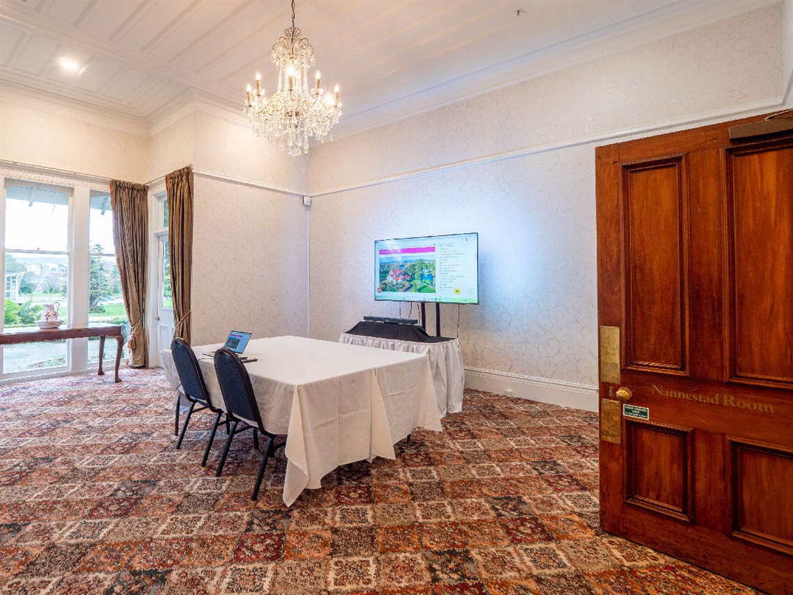 image shows the meeting set up in a room
