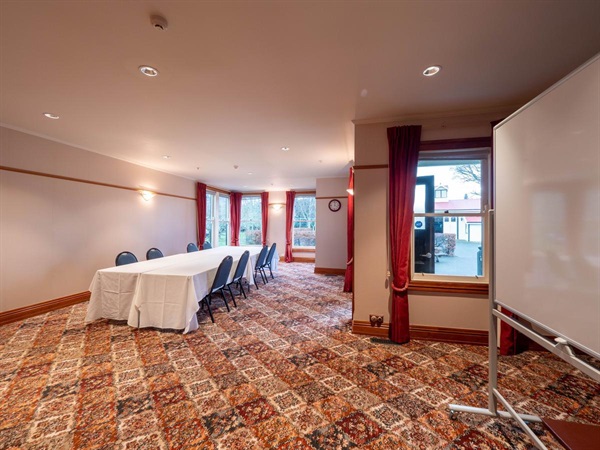image shows interior set up of a meeting room